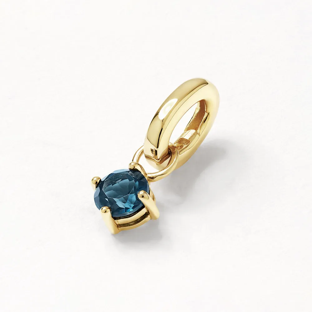 Blue Topaz Round Charm Pendant in Gold