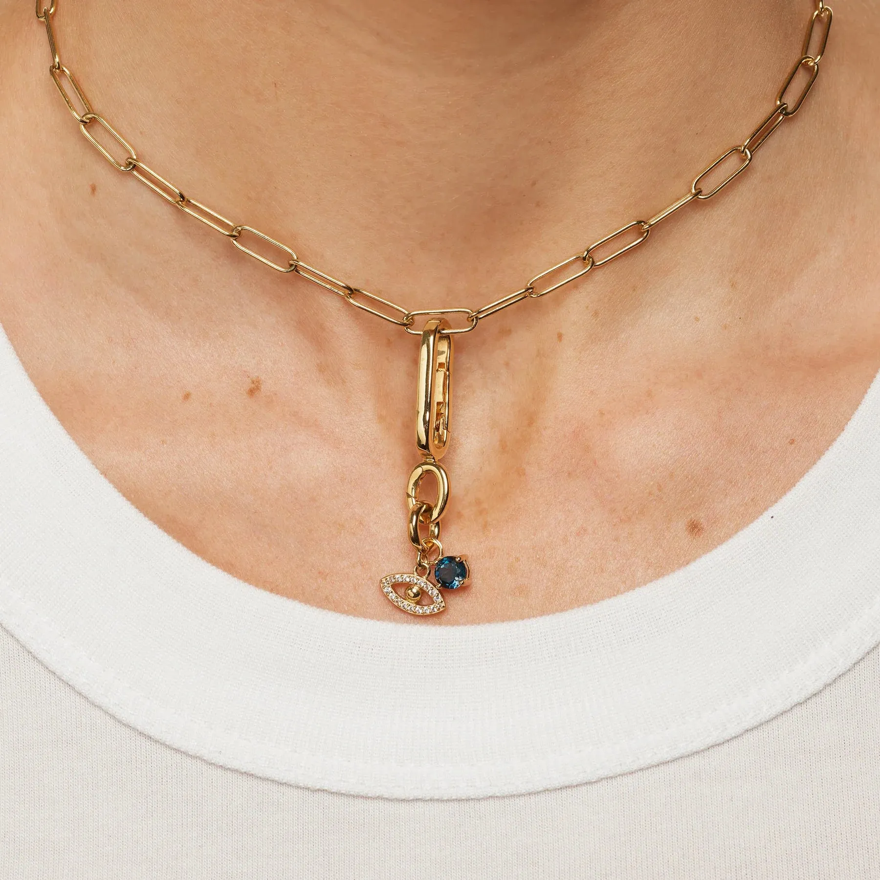Blue Topaz Round Charm Pendant in Gold