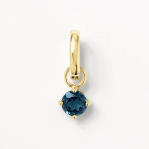Blue Topaz Round Charm Pendant in Gold