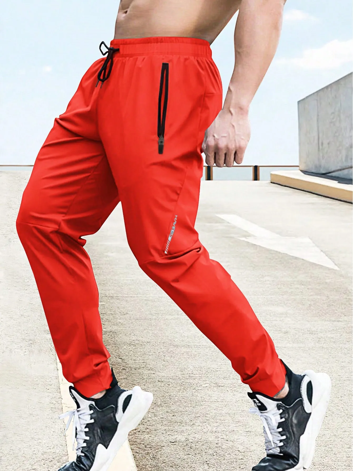 Drawstring Waist Zipper Pocket Sports Trousers