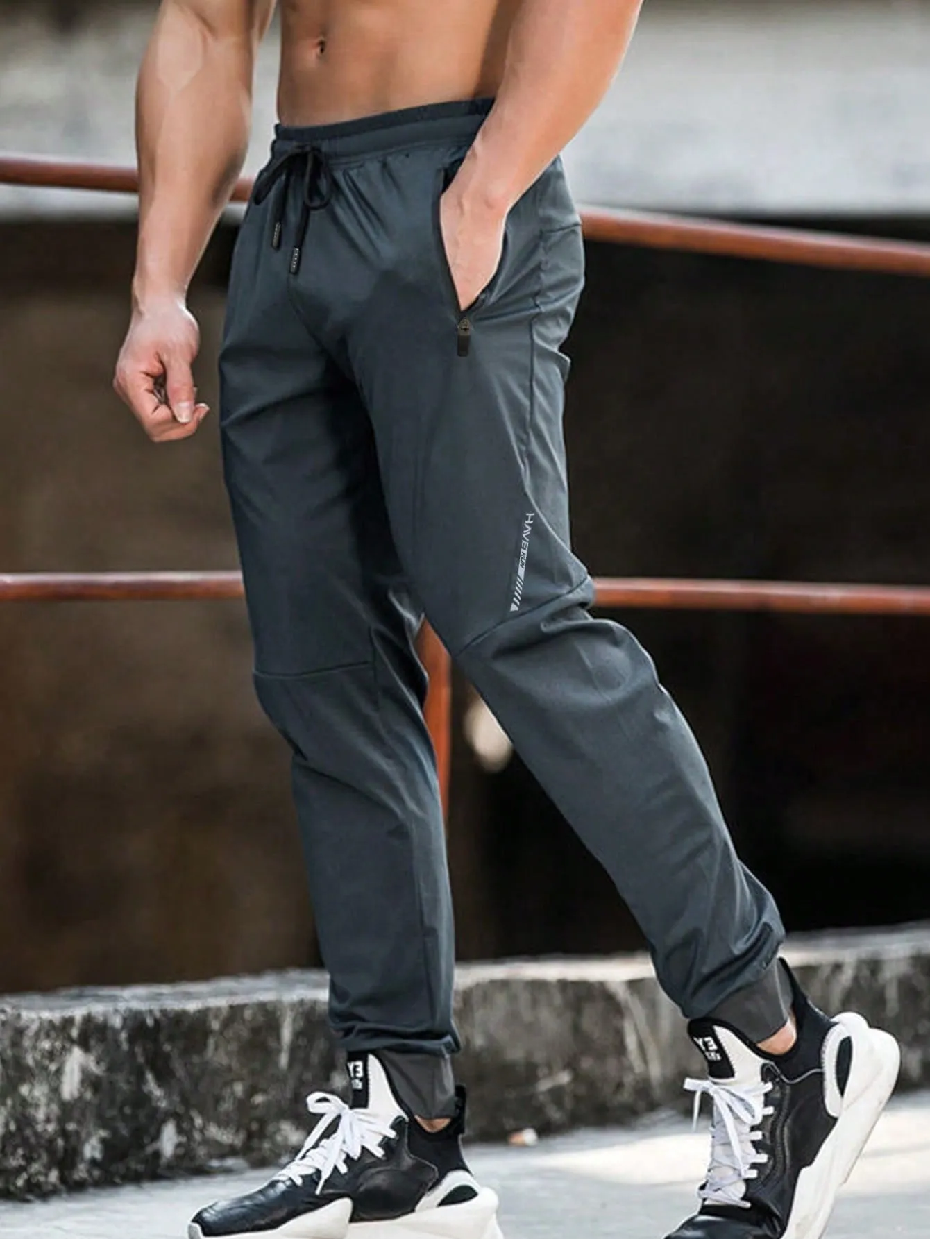 Drawstring Waist Zipper Pocket Sports Trousers