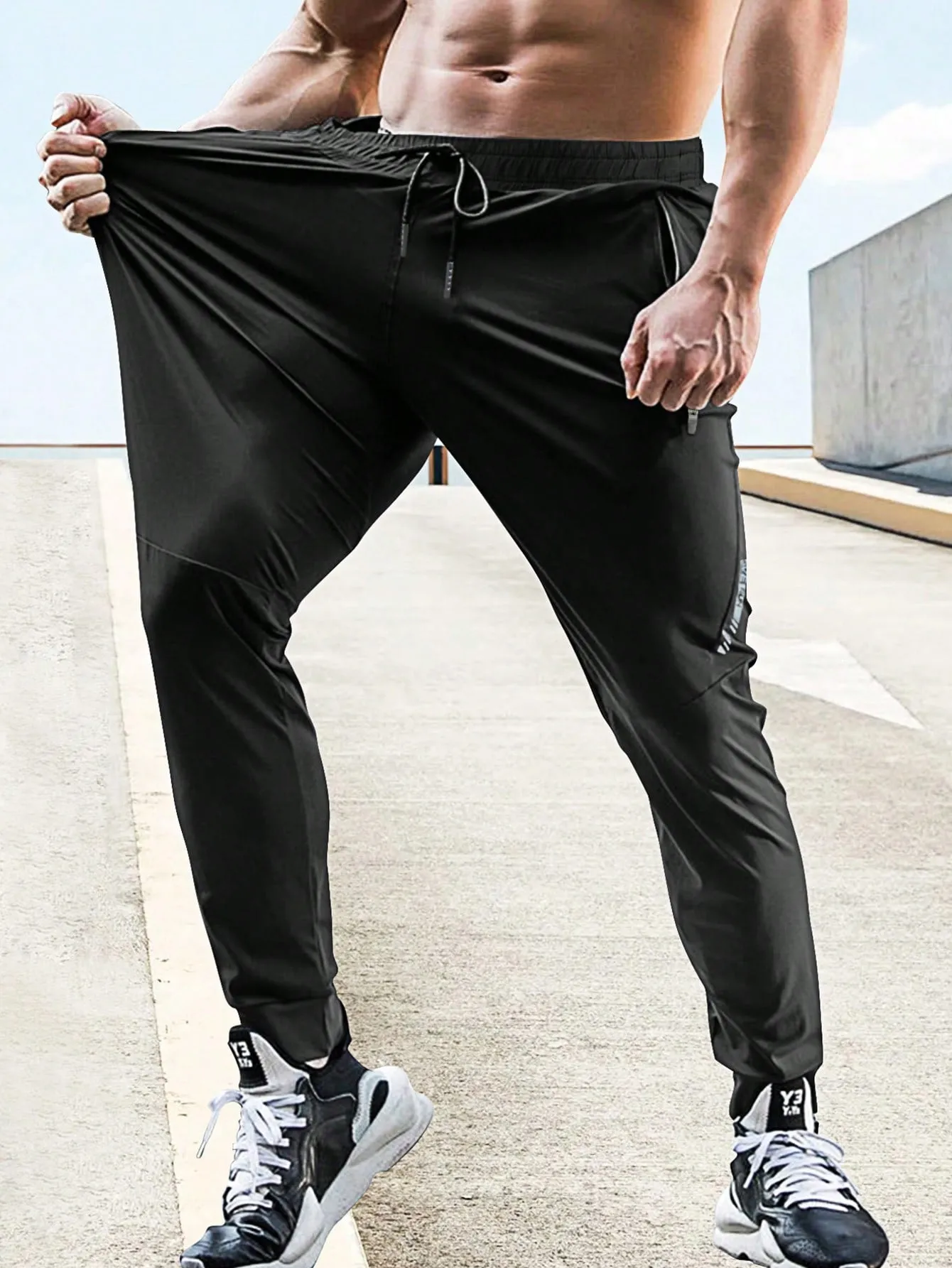 Drawstring Waist Zipper Pocket Sports Trousers