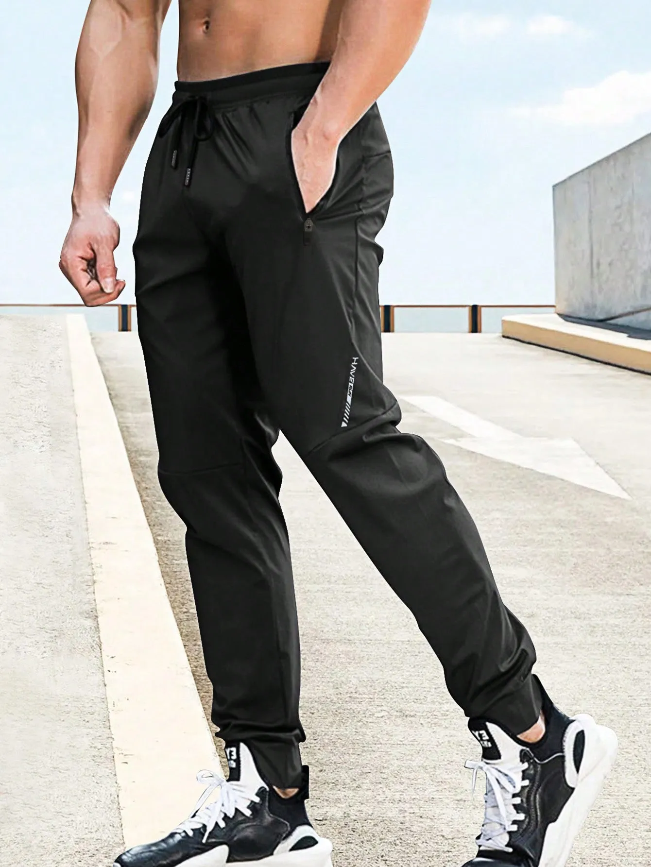 Drawstring Waist Zipper Pocket Sports Trousers